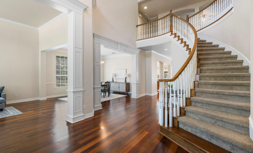 You welcomed by a grand staircase and wood floors throughout most of the downstairs. 
