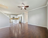 The main floor features tall ceilings wrapped in crown molding and gorgeous engineered hardwoods.