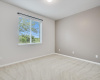 Provide loved ones with a cozy haven in this spacious lower-level bedroom, offering privacy and relaxation for all