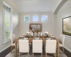 Share hearty meals and heartfelt conversations in this welcoming dining room, where the atmosphere is warm and the memories are plentiful *Virtually staged photo