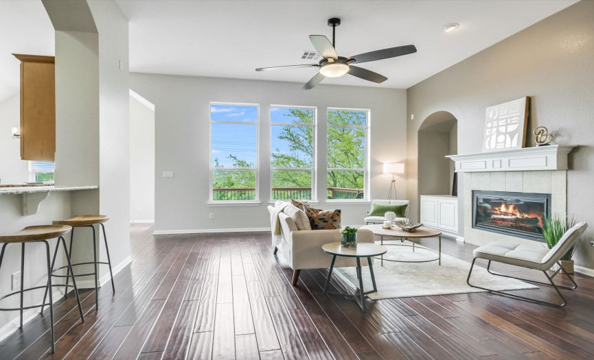 There are two living spaces (one upstairs and one downstairs) for entertaining, with the main floor living space featuring an open concept with a gas fireplace