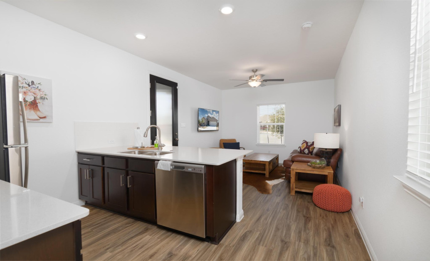 The guest suite has its own front entrance, kitchen, dining and bedroom. It's the perfect spot for guests. They are close by but have their own space. Multi-generational house!