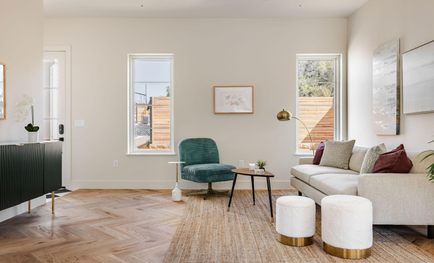 Living area with herringbone oak flooring.