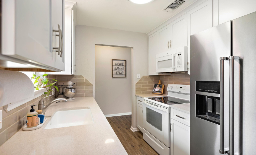 The kitchen offers entry on both sides for convenience.