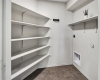 Spacious pantry and laundry facility 