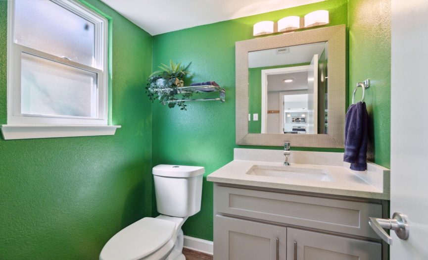 Enjoy the convenience of a half bathroom on the main floor, providing functionality for guests and residents alike.