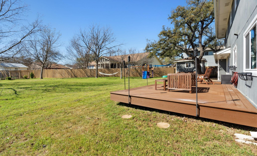 Embrace outdoor living on the spacious deck, perfect for hosting gatherings or enjoying al fresco dining.