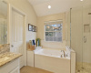 Master bath with walk-in shower and tub.