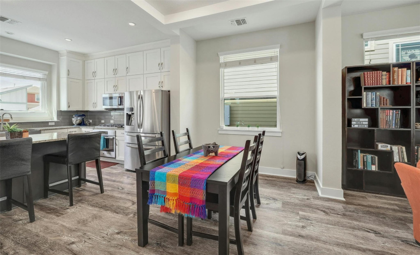 Proximity to kitchen lets guests/family interact