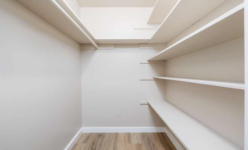 A moderate-sized closet for the main bedroom.