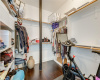 The primary bedroom has a large walk-in closet, large enough for a Peloton.
