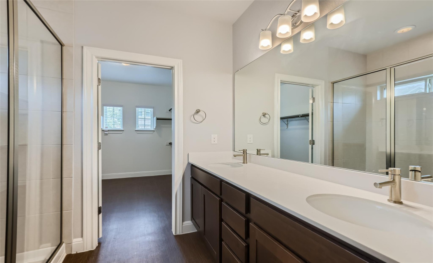 Spacious Primary Bathroom with Walk-in Shower and Closet in the back