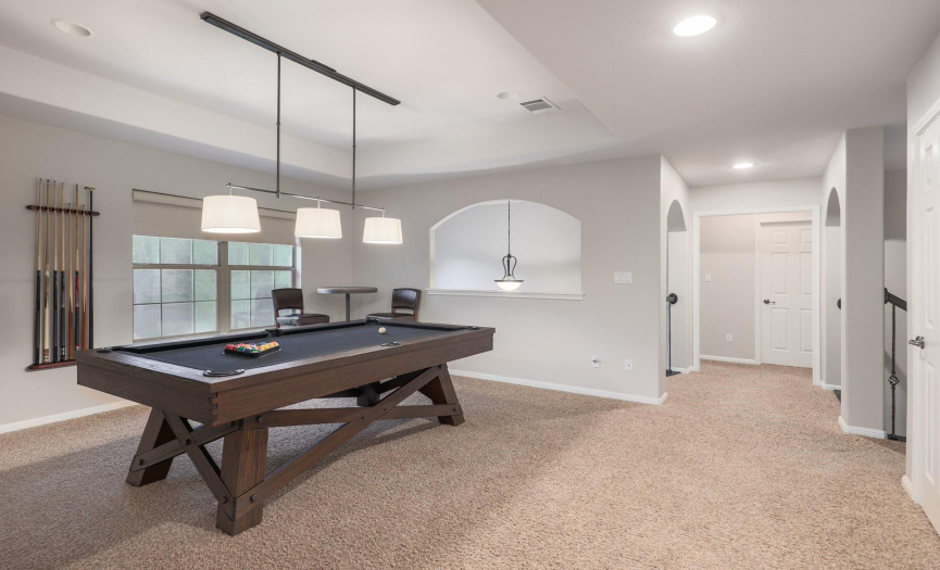 Large game room at the top of the staircase.