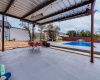 Covered Patio In Pool Area Is Great For Entertaining Family & Friends