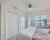 Bedroom with access to covered patio with views of Lake Travis
