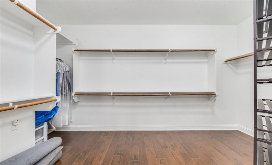 Extra large primary walk in closet has plenty of space for 2. 