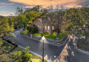 Nestled in the trees 2203 Onion Creek is a special property with a private courtyard.