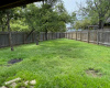 The back yard is completely fenced -- the perfect for your children to play or pets tor roam.