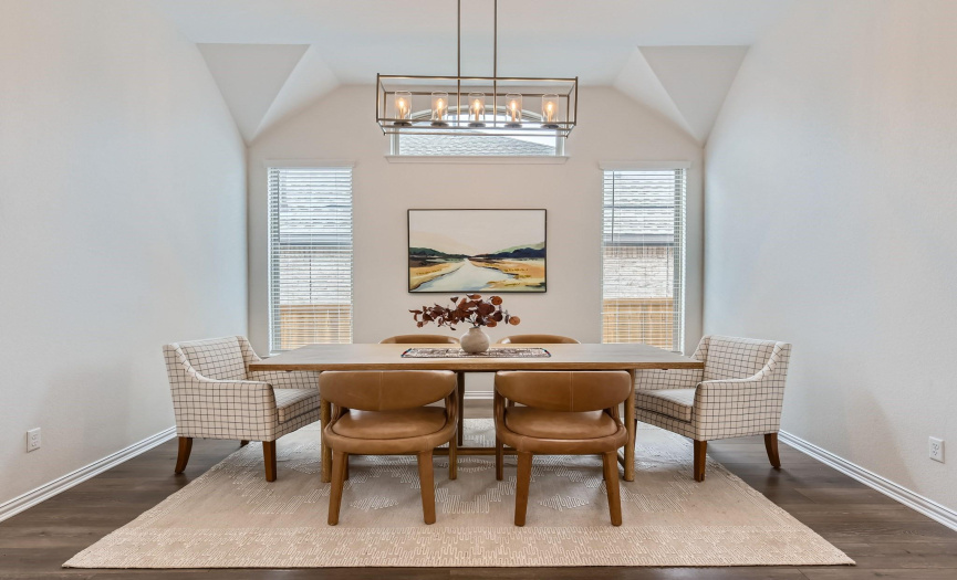 The formal dining room provides the perfect gathering space for guests.