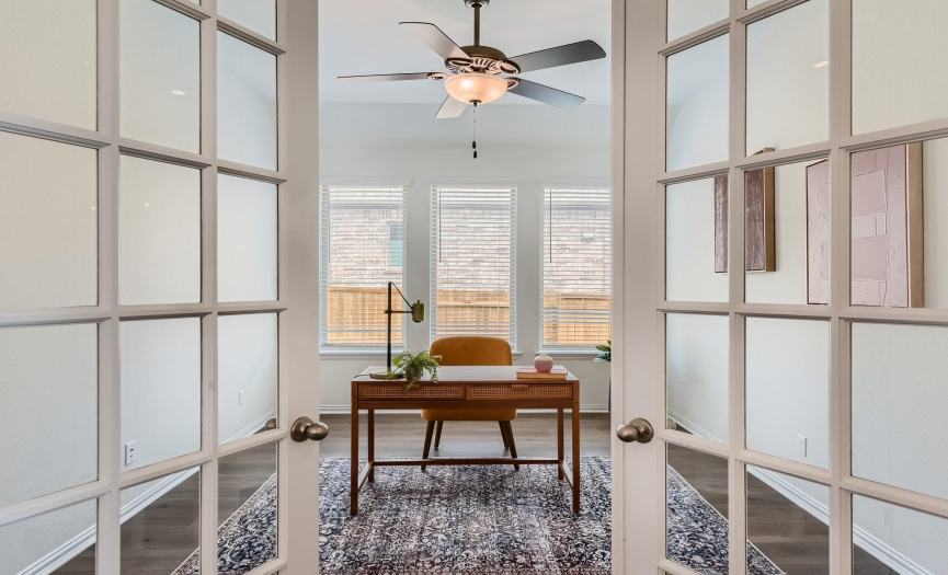 French doors provide privacy for the home office.