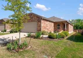 Lovely garden home in Sun City offers great curb appeal & 4 sides brick.