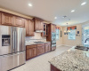 Kitchen features lovely upgraded cabinets and Santa Cecilia granite counters.