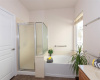   This bath offers a separate soaking tub plus walk in shower
