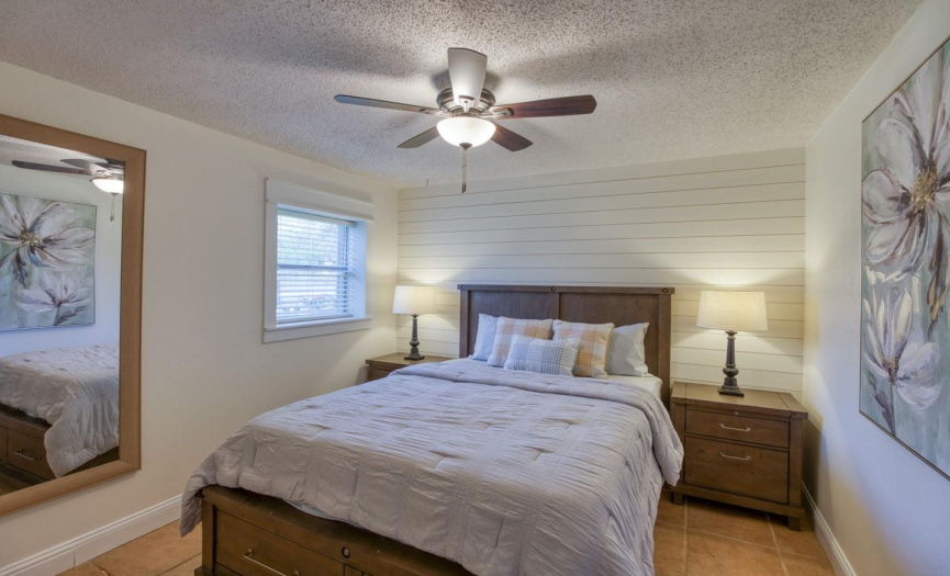 Experience comfort in the second bedroom, a cozy space perfect for relaxation or rest.