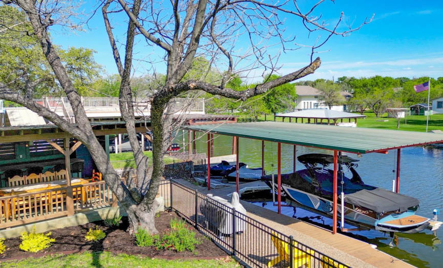 Take advantage of the covered boat slip, providing convenient access to the waters of Lake LBJ for boating adventures, fishing excursions, and leisurely cruises.