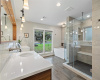 Look how spacious this primary bathroom is with a great soaking tub and walk-in shower. 