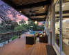 Entertain all day on this patio which has a covering that automatically closes when it senses rain.