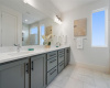 Great natural lighting with two windows in the primary bath. 