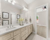 Jack and Jill bathroom services secondary bedrooms #2 and #3 and features new countertops.