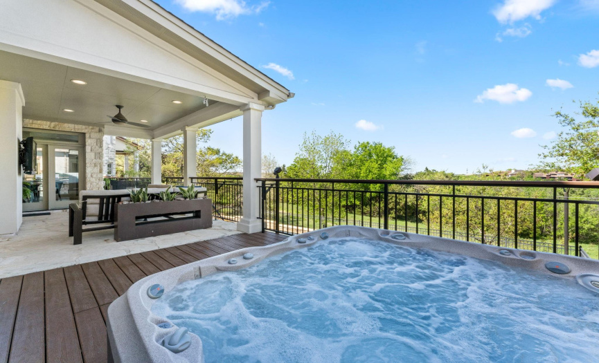 Relax in the Jacuzzi spa located right off the primary bedroom