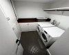 Laundry room with ample storage & cabinet space