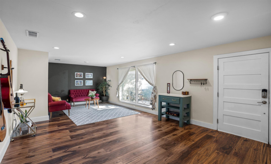 Beautiful Woodlife Flooring throughout this massively updated home.