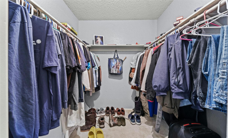 Excellent storage space in the walk-in closets off the primary bedrooms. 