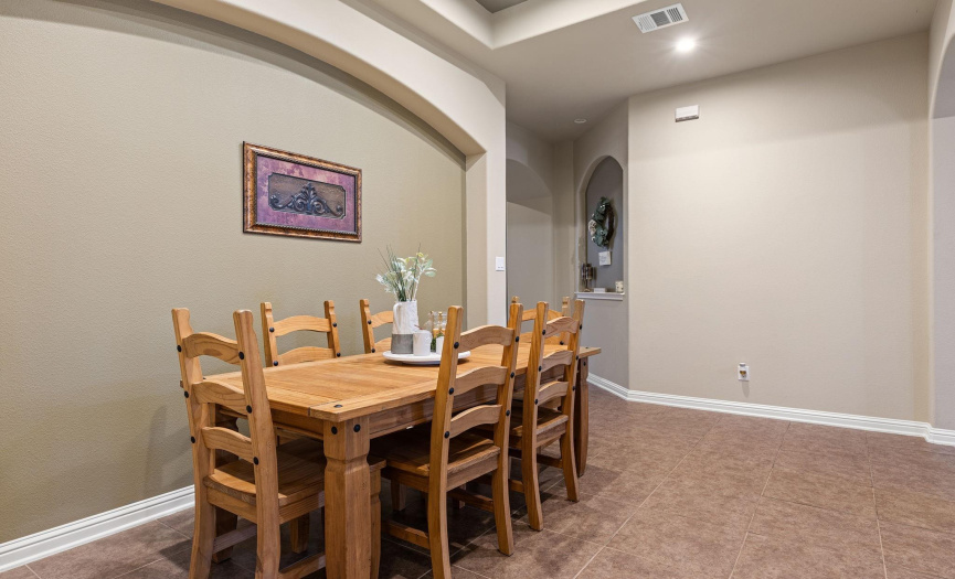 Great room: dining area with tray ceiling