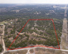 Red aerial boundary line does NOT represent actual property lines, and is approximate. Buyer to verify actual property boundary lines with survey (if available) or buyer due diligence.