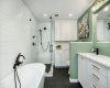 BEAUTIFUL updated Primary Bathroom with large soaker tub, separate shower, double vanities and plenty of storage.