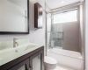 The second full bathroom features a large soaking tub/shower combo and clean, modern fixtures.