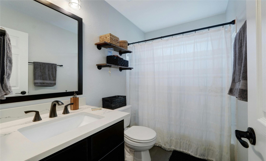 Elevate your daily routine in the large second-floor bathroom. With ample space, high-end fixtures, and a well-thought-out design, it offers both functionality and style.