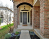 The clean and well-maintained front entry welcomes you home, providing an inviting first impression to guests.