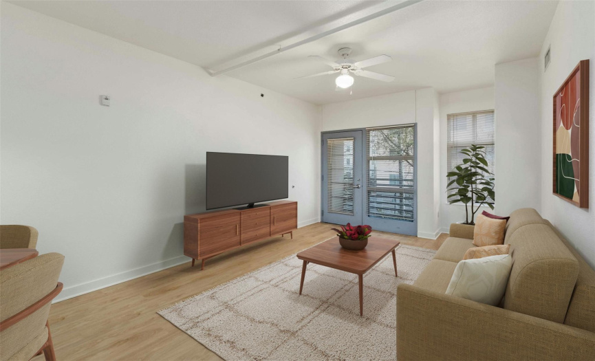 Virtually staged ~ main living area with access to balcony