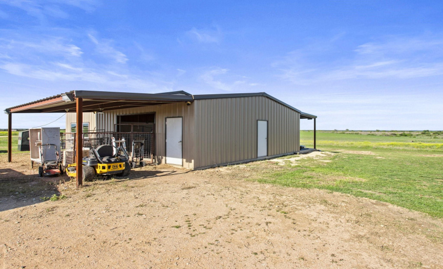 The livestock barn has two exterior overhangs.