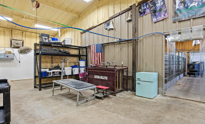 This area of the barn contains pens, counter area with sink, and the wash rack.  