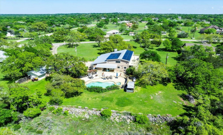 Experience the best of both worlds with this location, perfectly positioned between urban amenities and suburban tranquility, allowing you to enjoy the serene hill country lifestyle while remaining within reach of city attractions.