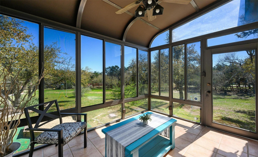 Enjoy privacy and relaxation on the private screened patio, perfect for quiet mornings or cozy evenings outdoors.