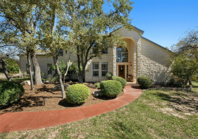 Welcome to this exquisite hill country estate nestled on a beautiful 1.23-acre lot in the heart of Dripping Spring.