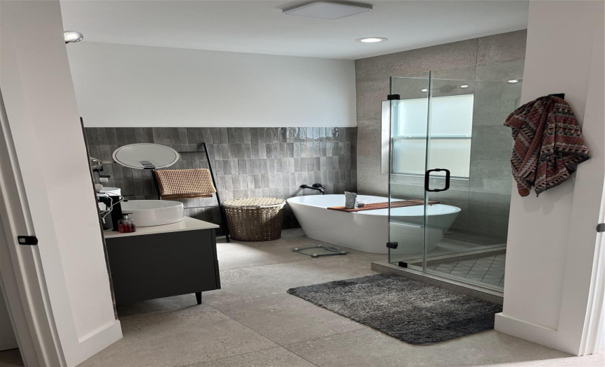 Main bath with Alexa, soaking tub, separate showe and vanity